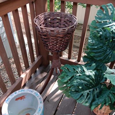 FAUX PLANT, BRASS PLANT STAND, KOI THEMED PLANTER, FAKE ROCK W/WORDS AND A WICKER PLANT STAND