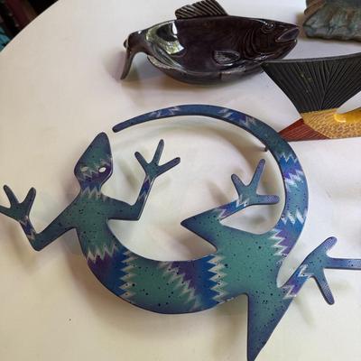 Four fish figures and cool lizard trivet