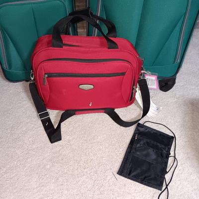 2 PIECE LUGGAGE ON 2 WHEELS EACH AND A CARRY ON BAG