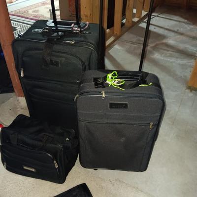 2 PIECE LUGGAGE ON 2 WHEELS EACH PLUS A CARRY ON BAG