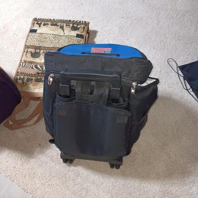 SOFT SIDED COOLER ON 2 WHEELS W/HANDLE, CARRY ON BAG ON WHEELS AND TALL BAG ON WHEELS