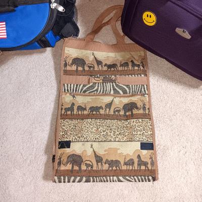 SOFT SIDED COOLER ON 2 WHEELS W/HANDLE, CARRY ON BAG ON WHEELS AND TALL BAG ON WHEELS
