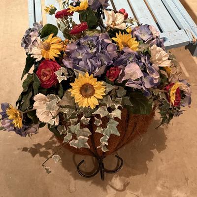 Faux flower arrangement