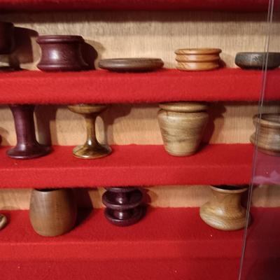 MINIATURE WOODEN VESSELS HANDMADE BY OUR CLIENT IN A HANDMADE DISPLAY CASE