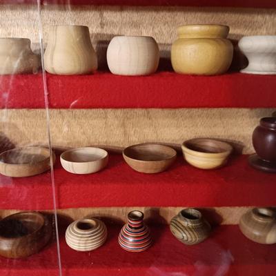 MINIATURE WOODEN VESSELS HANDMADE BY OUR CLIENT IN A HANDMADE DISPLAY CASE