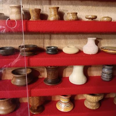 MINIATURE WOODEN VESSELS HANDMADE BY OUR CLIENT IN A HANDMADE DISPLAY CASE