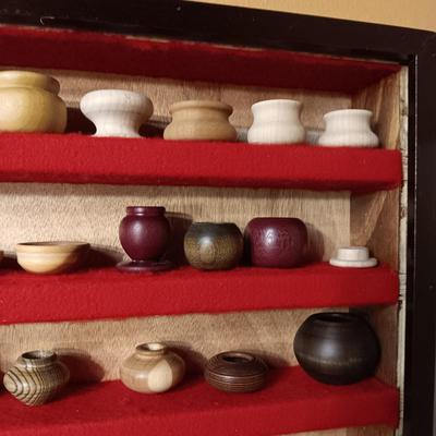MINIATURE WOODEN VESSELS HANDMADE BY OUR CLIENT IN A HANDMADE DISPLAY CASE