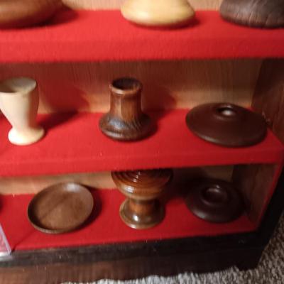 MINIATURE WOODEN VESSELS HANDMADE BY OUR CLIENT IN A HANDMADE DISPLAY CASE