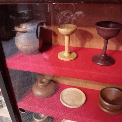 MINIATURE WOODEN VESSELS HANDMADE BY OUR CLIENT IN A HANDMADE DISPLAY CASE