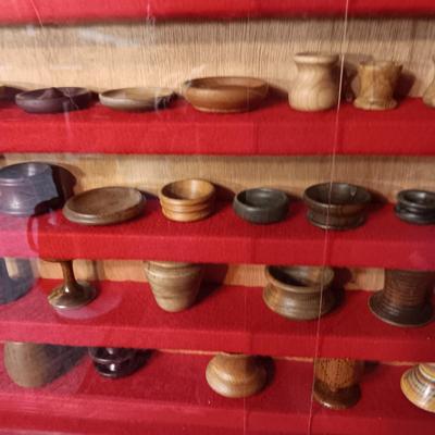 MINIATURE WOODEN VESSELS HANDMADE BY OUR CLIENT IN A HANDMADE DISPLAY CASE
