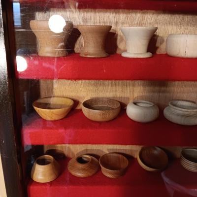MINIATURE WOODEN VESSELS HANDMADE BY OUR CLIENT IN A HANDMADE DISPLAY CASE