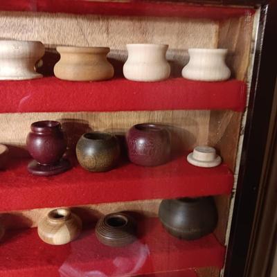 MINIATURE WOODEN VESSELS HANDMADE BY OUR CLIENT IN A HANDMADE DISPLAY CASE