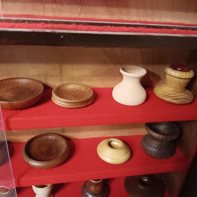 MINIATURE WOODEN VESSELS HANDMADE BY OUR CLIENT IN A HANDMADE DISPLAY CASE