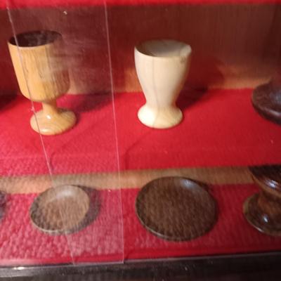 MINIATURE WOODEN VESSELS HANDMADE BY OUR CLIENT IN A HANDMADE DISPLAY CASE
