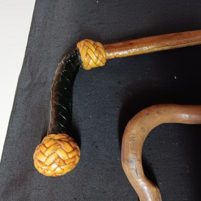2 VINTAGE WOODEN CANES AND AN OLD UMBRELLA