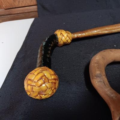 2 VINTAGE WOODEN CANES AND AN OLD UMBRELLA