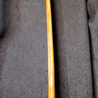 2 VINTAGE WOODEN CANES AND AN OLD UMBRELLA