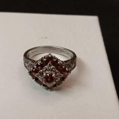 STERLING SILVER RING WITH GARNETS 5.70g SIZE 7 1/2 MARKED CNA
