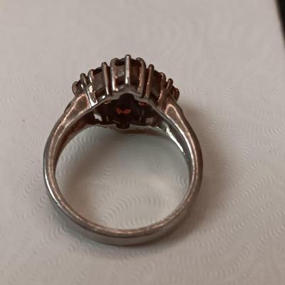STERLING SILVER RING WITH GARNETS 5.70g SIZE 7 1/2 MARKED CNA