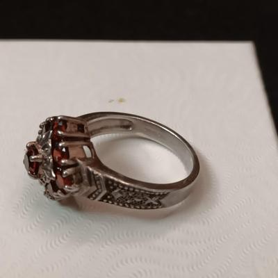 STERLING SILVER RING WITH GARNETS 5.70g SIZE 7 1/2 MARKED CNA
