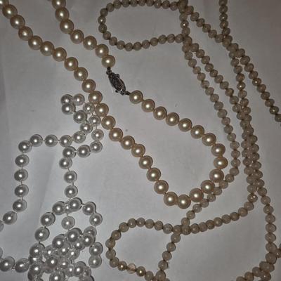 Pearl and beaded necklace strands