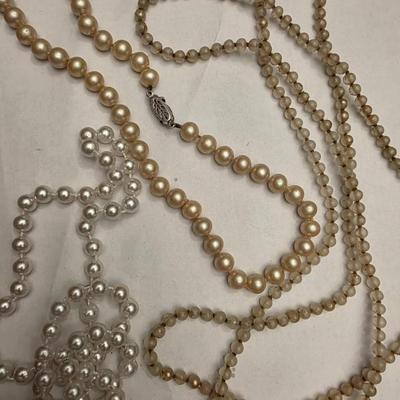 Pearl and beaded necklace strands