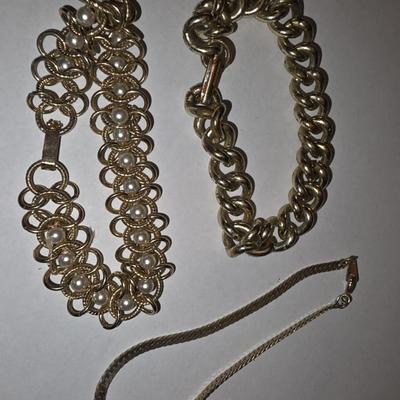Three Gold Tone Bracelets