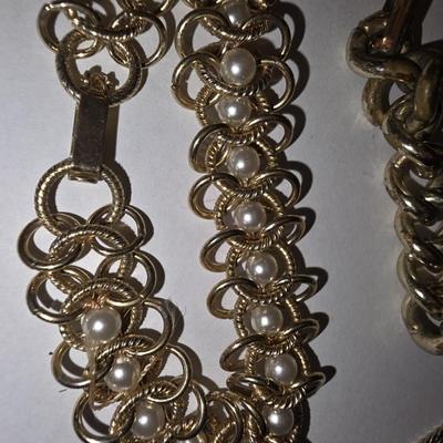 Three Gold Tone Bracelets