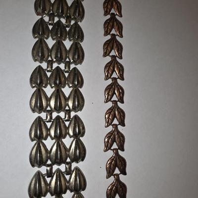 Pair of link bracelets.
