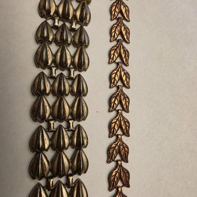 Pair of link bracelets.