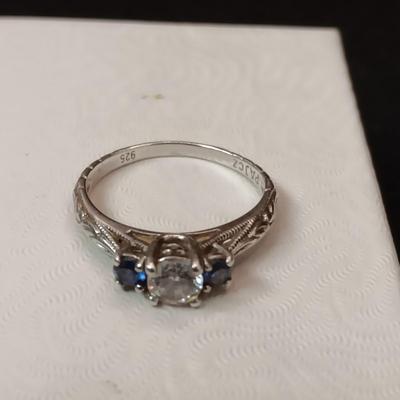 STERLING SILVER RING WITH CZ AND BLUE TOPAZ STONES 3.34g SIZE 9 1/2