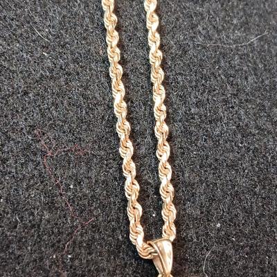 14K GOLD CHAIN (2.42g) WITH A 10K HEART PENDANT (11.37)