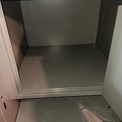 LOCKING FILING CABINET WITH A COMBO SAFE