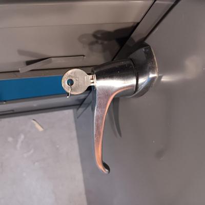 LOCKING FILING CABINET WITH A COMBO SAFE
