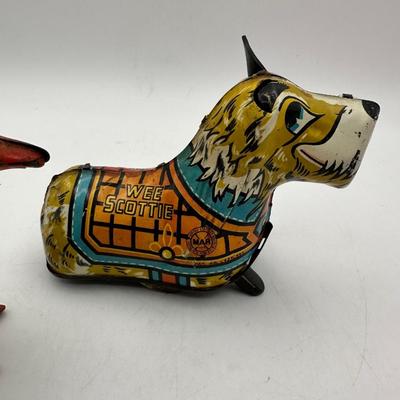 Sale Photo Thumbnail #551: Classic penguin and “Wee Scottie” wind up toys. Neither function, see pics for condition.