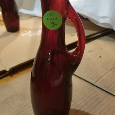 Sale Photo Thumbnail #52: Red glass cruet. 2.5 inches wide, 8 inches tall.