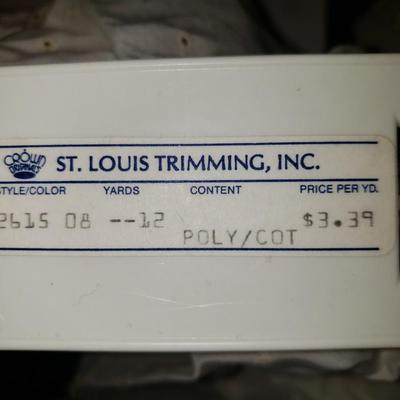 Sale Photo Thumbnail #152: 5 1/4" wide x about 17 yards long. Made by St. Louis Trimming, Inc. Style 2615. Color 08. Poly/cotton. Great condition.
