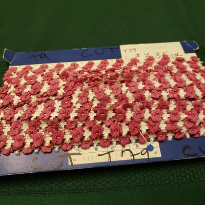 Sale Photo Thumbnail #158: Believed to be vintage. Still wound on cardboard. Marked No. 7110, 411. T79 written in marker on cardboard. 1/4" wide x about 18 yards. Good condition.