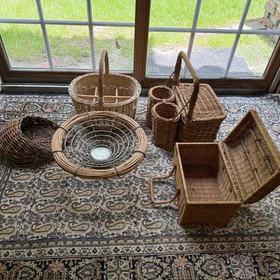 Gorgeous wool oriental rug in browns and cream (baskets sold separately!)
