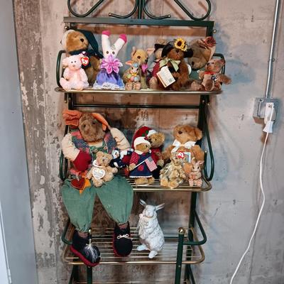 A COLLECTION OF PLUSH ANIMALS WITH A TOTE