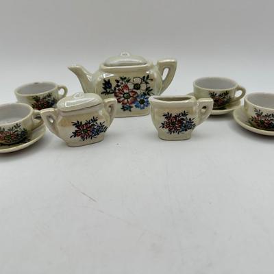 Sale Photo Thumbnail #792: Handpainted porcelain with shiny iridescent glaze from Japan.