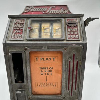 Sale Photo Thumbnail #21: One penny for a chance to win a pack of cigarettes or dispense a piece of gum! Untested and the back is included but it doesn’t stay closed