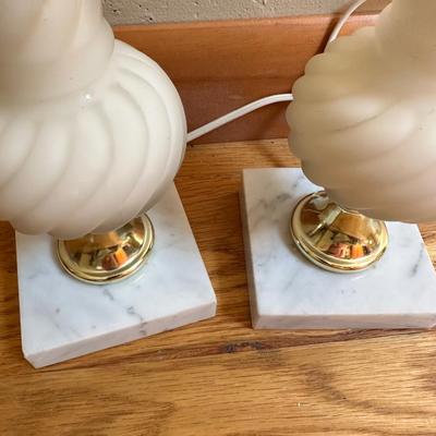 Sale Photo Thumbnail #846: Milk glass twisted table lamps, brass foot on marble base. Long cords, both tested and work