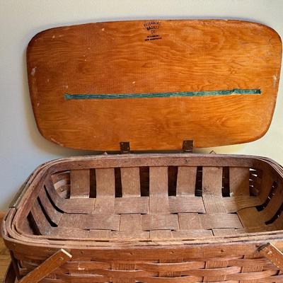Sale Photo Thumbnail #860: Large vintage hand woven basket with wooden handles lid.