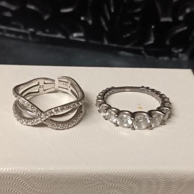 2 STERLING SILVER RINGS W/RHINESTONES BOTH ARE SIZE 6 1/2