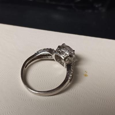 2 STERLING SILVER RINGS WITH CZ'S BOTH ARE SIZE 6 1/4