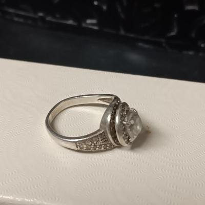 2 STERLING SILVER RINGS WITH CZ'S BOTH ARE SIZE 6 1/4