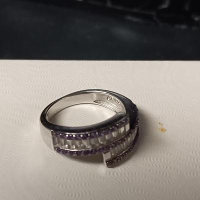 STERLING SILVER RING W/PURPLE AND CLEAR BAGUETTE STONES AND A STERLING RING WITH A BLUE STONE