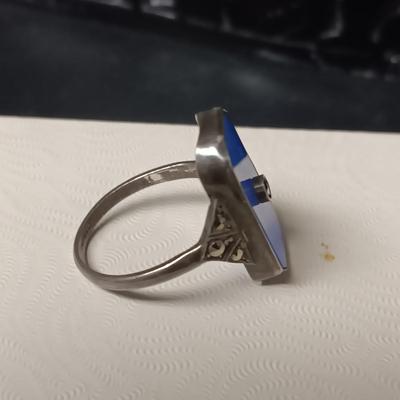 STERLING SILVER RING W/PURPLE AND CLEAR BAGUETTE STONES AND A STERLING RING WITH A BLUE STONE
