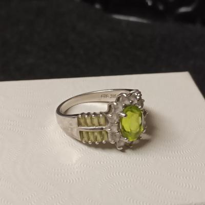STERLING SILVER WITH LIGHT GREEN BAGUETTES AND CENTER STONE SIZE 8
